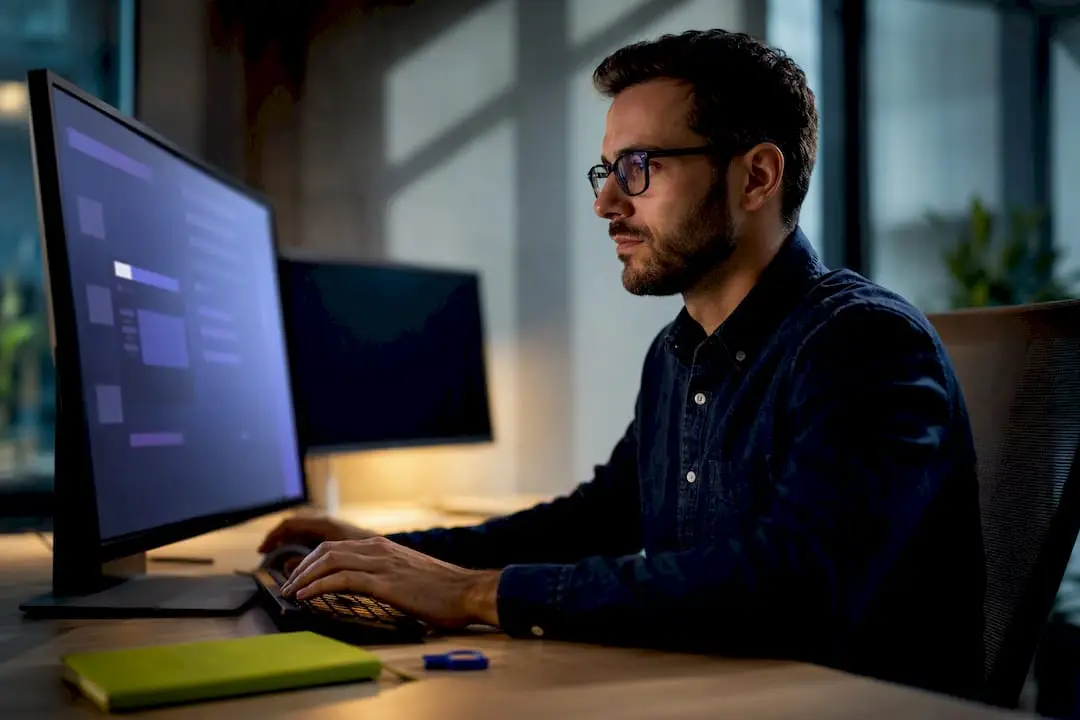 Engineer reviewing governed AI delivery workflow